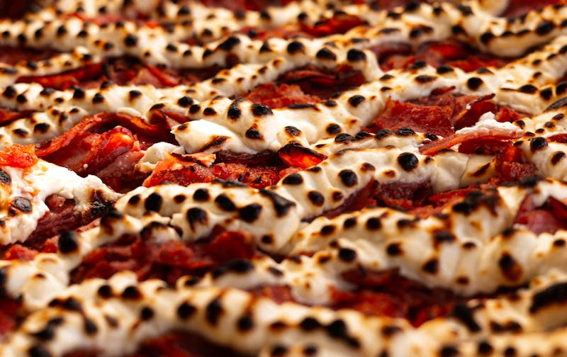 Four cheese pizza with mozzarella blend