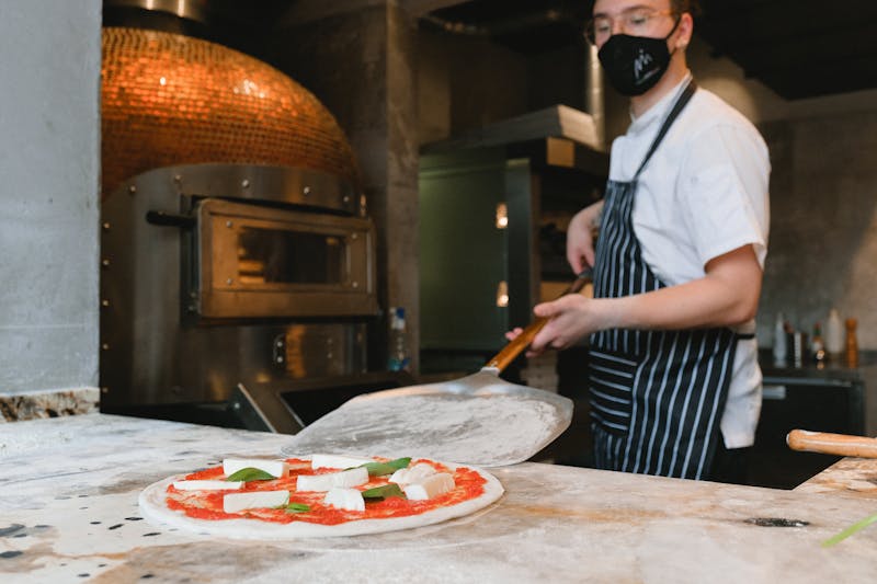 Punch Pizza catering setup with wood-fired pizzas for events